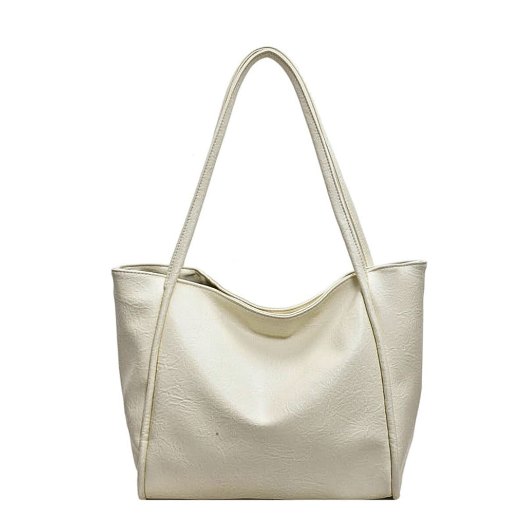 Beige leather tote bag with soft texture for women