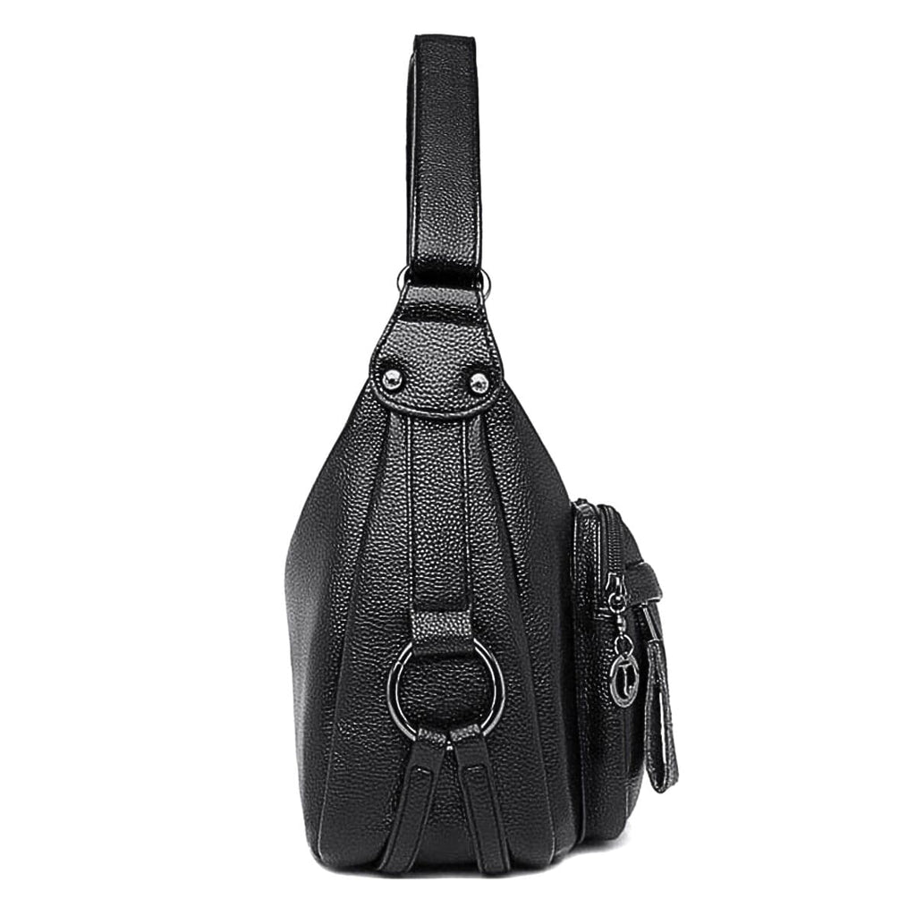 Black leather sling chest bag with silver hardware and adjustable shoulder strap