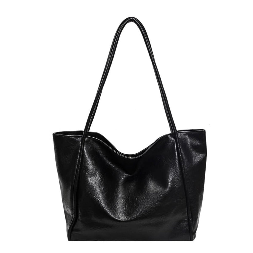 Black leather tote bag with glossy finish and shoulder straps