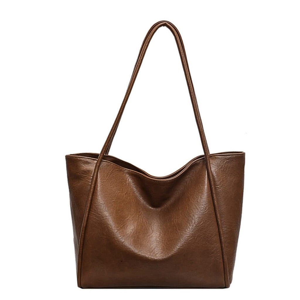 Brown leather tote bag with shoulder straps for women